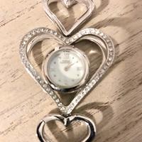 Orologio bracciale in acciaio e zirconi.