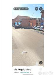 Negozio colorificio su tre lati