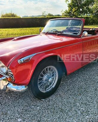 Triumph TR4 TR4A IRS Rosso Interni Pelle Nera 1966