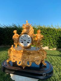 Orologio antico da camino