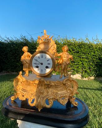 Orologio antico da camino