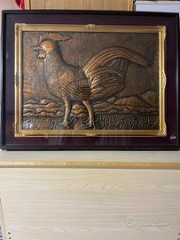 Quadro in rame descrive un gallo in bassorilievo