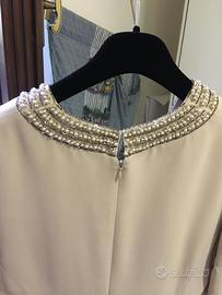 Abito tubino color crema con ricamo