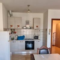 Cucina, camera e armadi