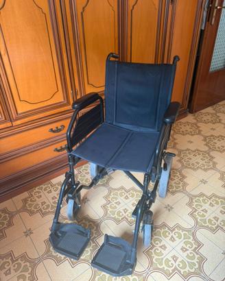 Sedia a rotelle pieghevole Surace
