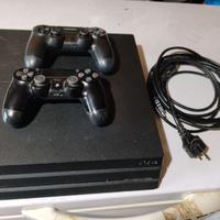 PS4 pro 1 TB con due pad e giochi