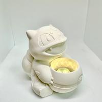 Lampda in cemento bulbasaur pokemon