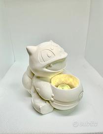Lampda in cemento bulbasaur pokemon
