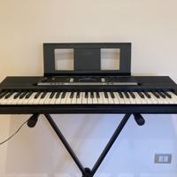 Pianola con custodia e piedistallo