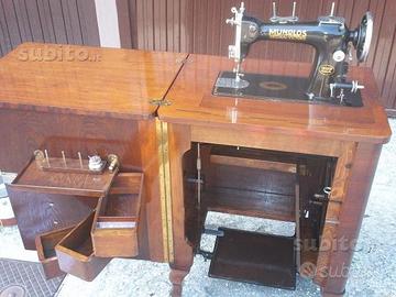 Antica macchina da cucire restaurata funzionante