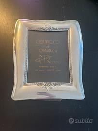Cornice in argento