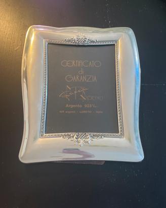 Cornice in argento