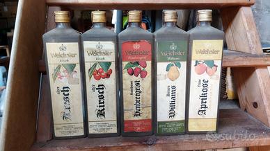 bottiglie di grappa invecchiate