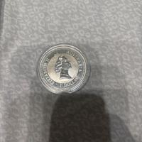 Monete argento 500 lire e 1 dollaro