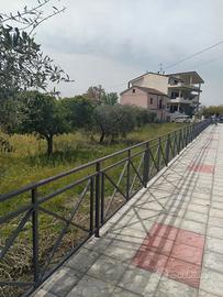 Terreno edificabile con fabbricati rurali