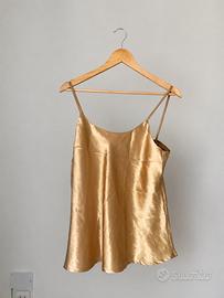 Top in color oro