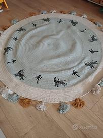 Tappeto rotondo in cotone intrecciato con pompon