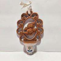 Piccola acquasantiera in terracotta e maiolica 