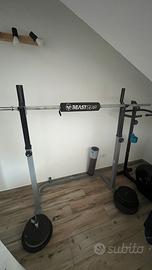 Panca + rack + bilanciere + manubri e pesi