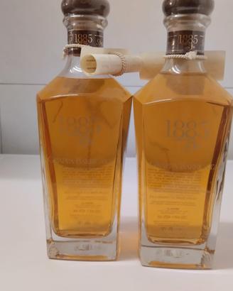  due bottiglie grappa barricata stravecchia 
