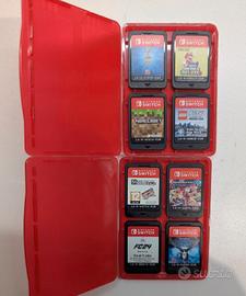 8 giochi Nintendo switch + due custodie