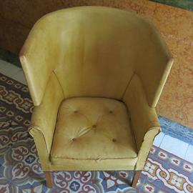 Poltrona a pozzetto  in pelle