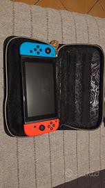 Switch 1 con 5 videogiocci e accessori per organiz