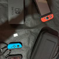 Nintendo switch + Mario kart Deluxe 8 + 4 joystick