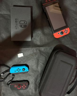 Nintendo switch + Mario kart Deluxe 8 + 4 joystick