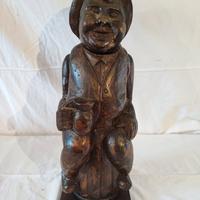 scultura in legno portabottiglie 