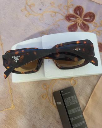 Prada occhiali da sole nuovi ,usati un paio di