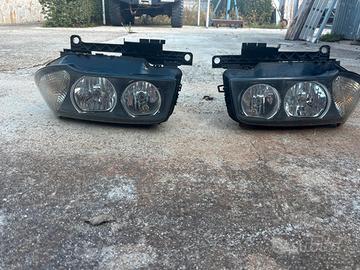 fanali anteriori BMW X3 e83