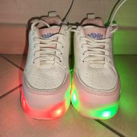 Scarpe da ginnastica con ruote retraibili