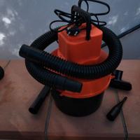 Piccolo aspirapolvere e cenere