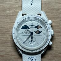 OMEGA Swatch Mission to Earthphase moonshine gold