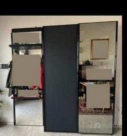 ARMADIO MODERNO CON ANTE SCORREVOLI