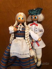 Bambole da collezione in legno