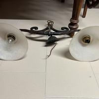 Ribasso.Lampadario in ferro battuto e vetro