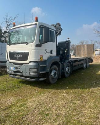 Man tgs cianale con rampe e gru hiab