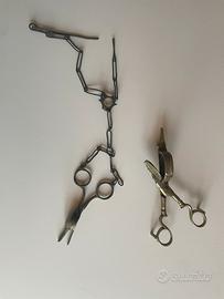 Forbici spegnicandela in blocco