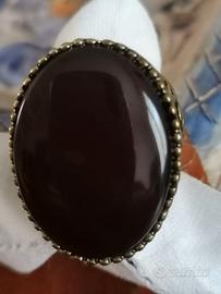 Anello bigiotteria con pietra viola scuro