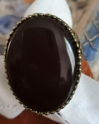 Anello bigiotteria con pietra viola scuro