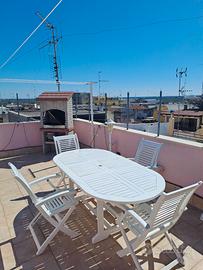 tavolo in legno da esterno con 4 sedie