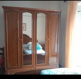 Camera da letto ben tenuta. 
