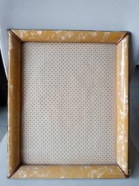 Elegante cornice di metà Novecento


