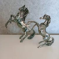 due cavalli in argento laminato
