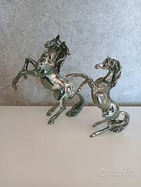 due cavalli in argento laminato