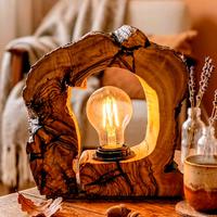Lampada artigianale in legno di ulivo e luce calda