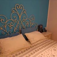 Testata letto in ferro battuto con rete