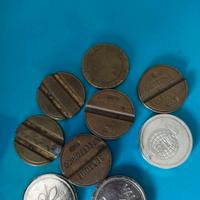 Lotto 9 gettoni (telefonici, giostre, altro) 